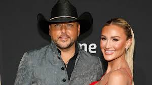 Jason Aldean says wife Brittany gets 'fired up' when defending him ...